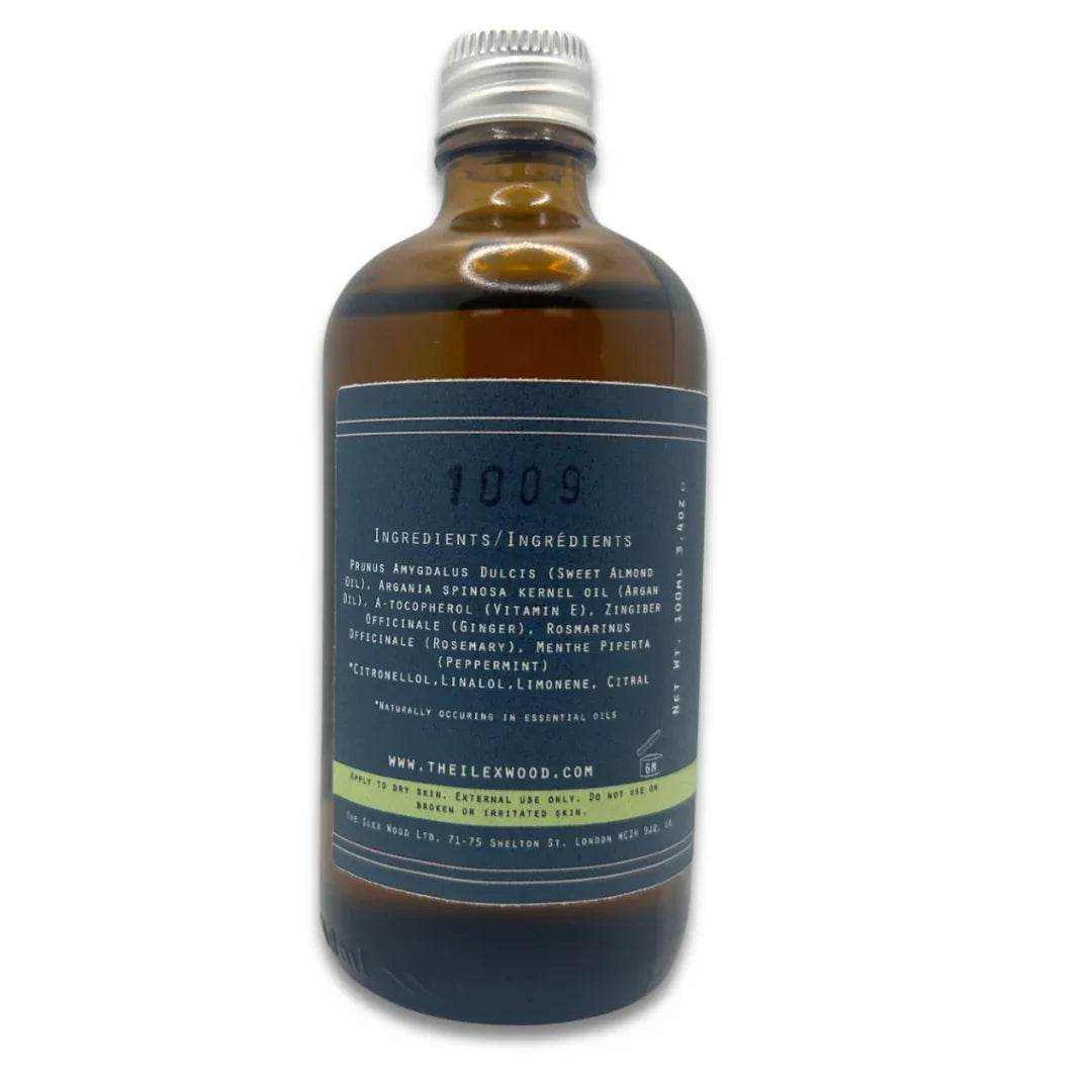 100ml glass bottle of Alleviate - Muscle Massage Oil with natural ingredients for muscle relief and vegan, cruelty-free care