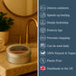 Tin of chocolate orange body balm on a bathroom counter with product features listed on the right.
